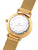 Gold watch with a white face on a white background